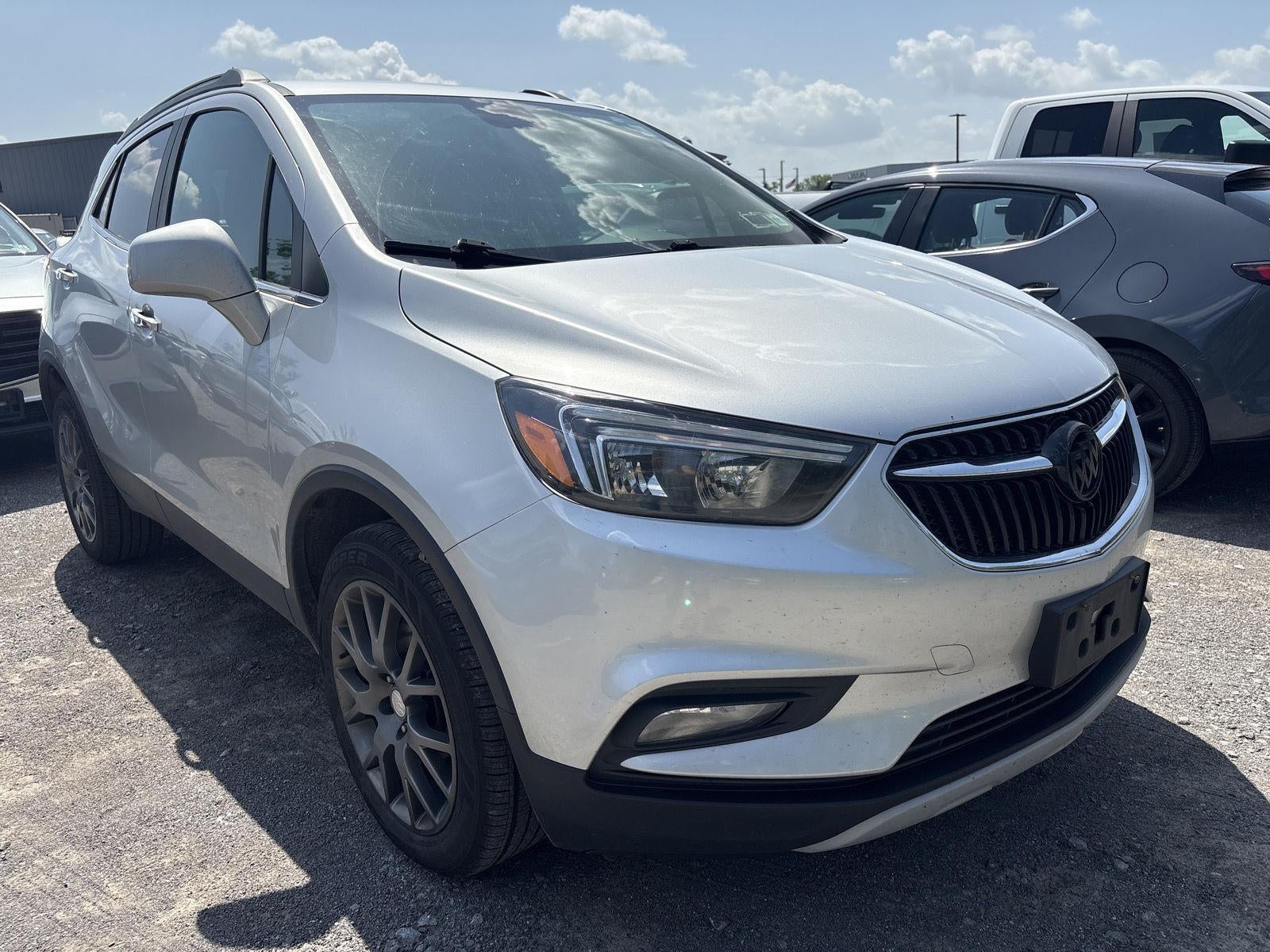 2020 Buick Encore Sport Touring in Quicksilver Metallic — front three-quarter view